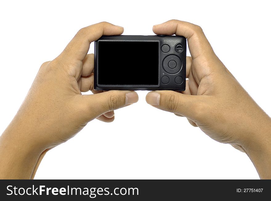 Man hand holding compact digital camera isolated over white background. Man hand holding compact digital camera isolated over white background