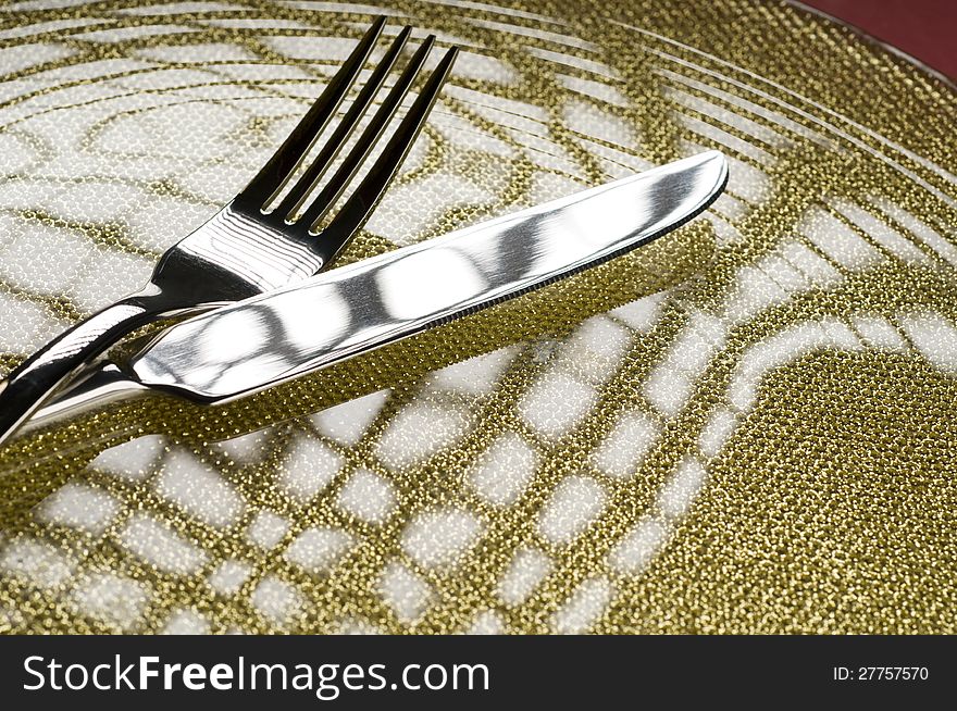 Fork and knife on a plate