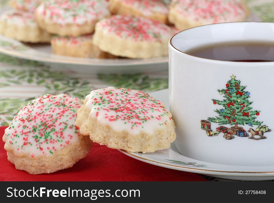 Two shortbread Christmas cookies and cup of coffee. Two shortbread Christmas cookies and cup of coffee