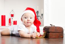 Child In Christmas Cap Stock Photos