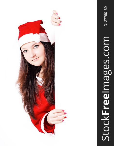 Pretty young girl dressed as Santa with a sign isolated