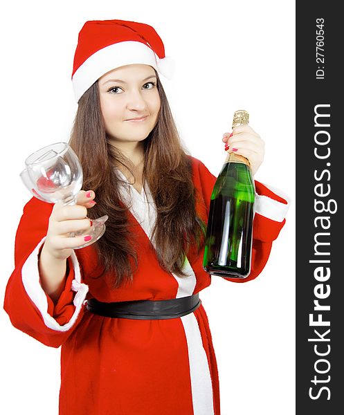 Cute teen girl dressed as Santa with champagne isolated