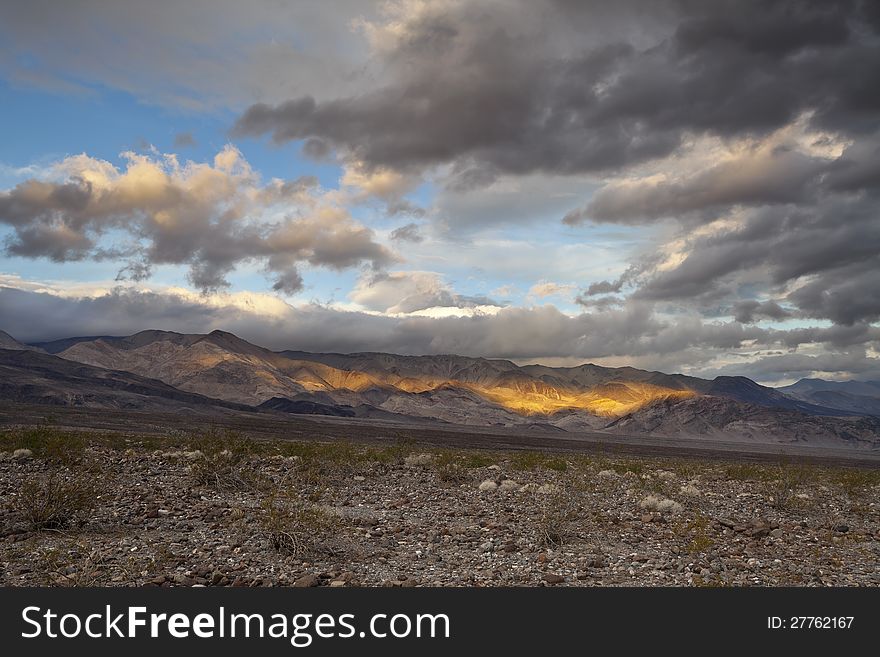 Image of dramatic sky and mountain range in Death Valley National Park, California. Image of dramatic sky and mountain range in Death Valley National Park, California.