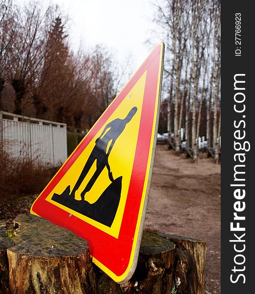 Warning sign, triangle, construction work, road being constructed. Warning sign, triangle, construction work, road being constructed