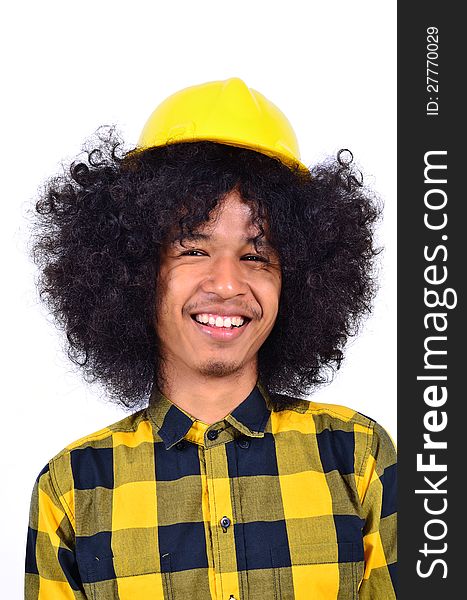 Young man with long hair and helmet as safety first concept