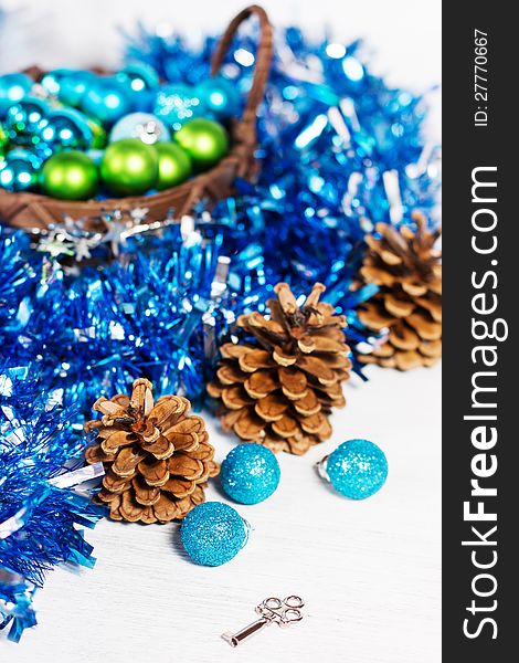 Christmas decoration with different balls and tinsel on white background