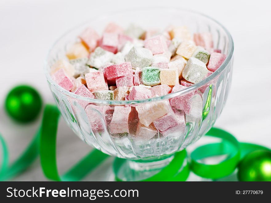 Christmas turkish delight decorated with green ribbon