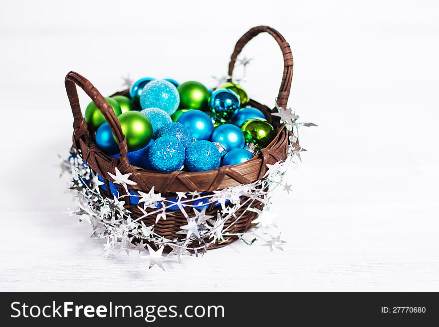 Christmas decoration with different balls and tinsel on white background