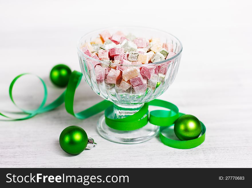 Christmas turkish delight decorated with green ribbon