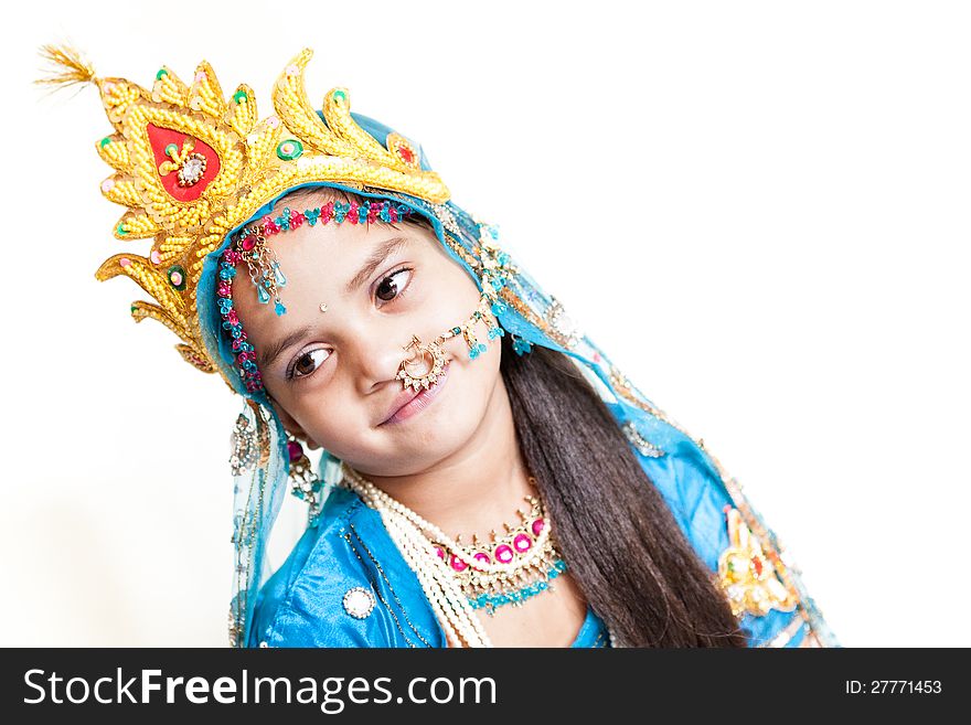 Girl Krishna : indian little girl with flute and makeup like Lord Krishna