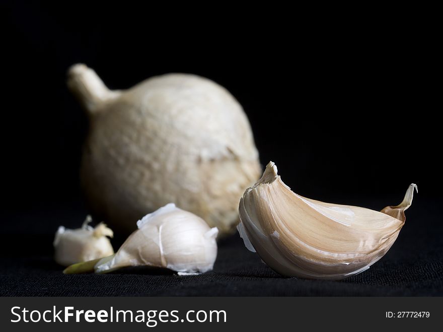 A garlic on black background