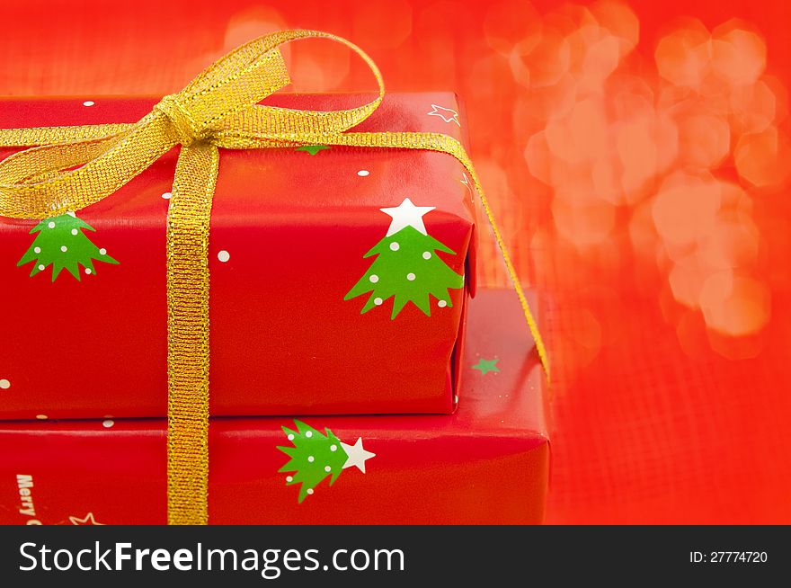 Gift boxes for Christmas on a red background