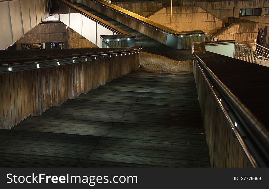 A lighted crossroad of starways at night. A lighted crossroad of starways at night