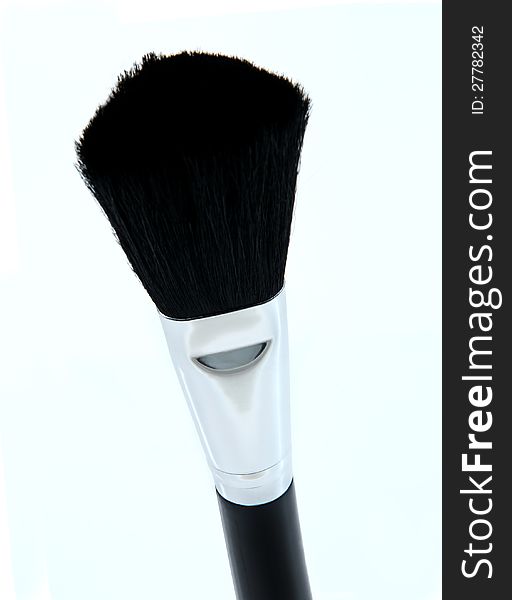 Larger make-up brushes for powder base and blush. Larger make-up brushes for powder base and blush