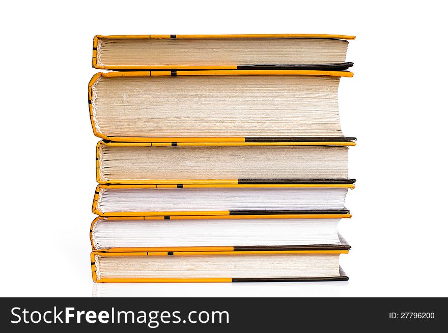 Big stack of yellow books  on white background. Big stack of yellow books  on white background