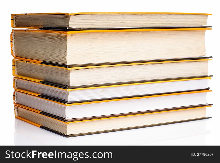 Big stack of yellow books on white background. Big stack of yellow books on white background