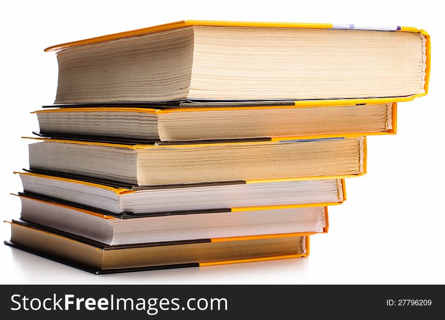 Big stack of yellow books on white background. Big stack of yellow books on white background