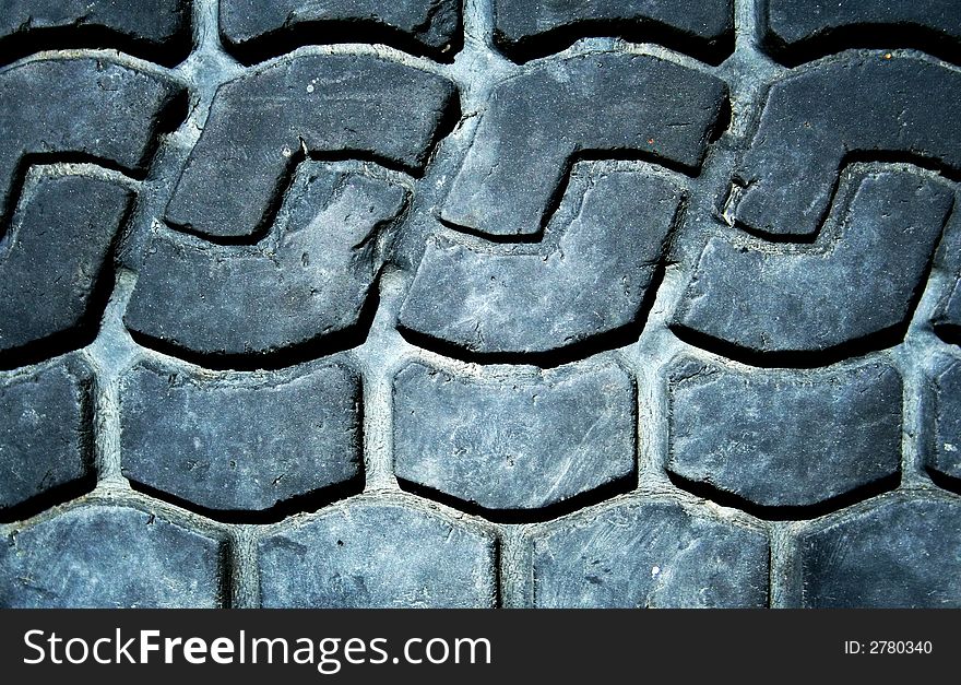 Old truck tire texture background. Macro