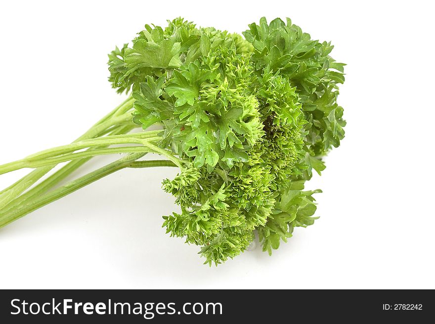 Bundle of parsley on the white