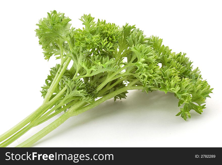 Bundle of parsley on the white