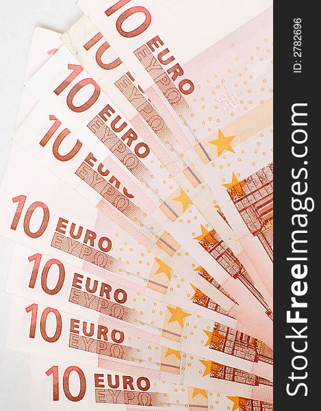 Bunch of Euro banknotes on desk