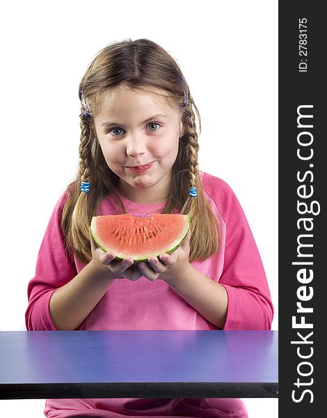 Adorable girl eating watermelon a over white background. Adorable girl eating watermelon a over white background