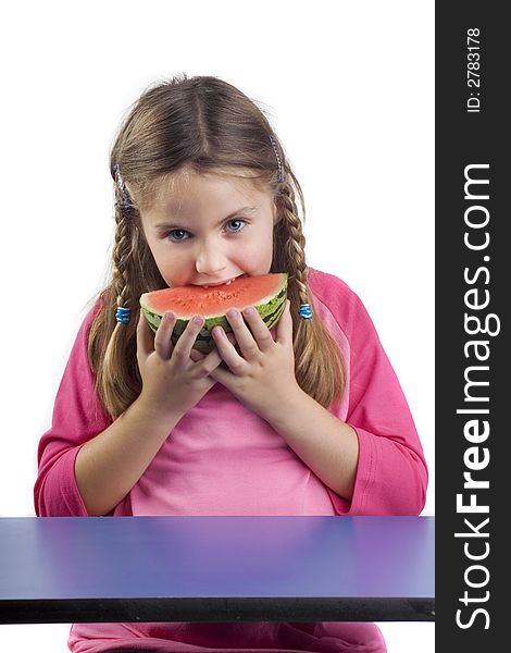 Adorable girl eating watermelon a over white background. Adorable girl eating watermelon a over white background
