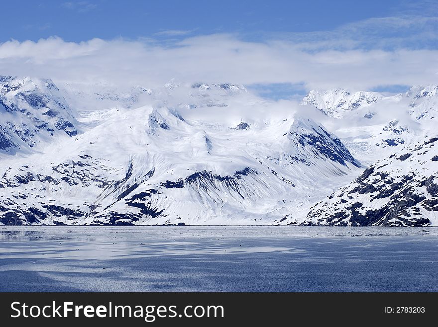The view of a white landscape in Glacier Bay national park, Alaska. The view of a white landscape in Glacier Bay national park, Alaska.