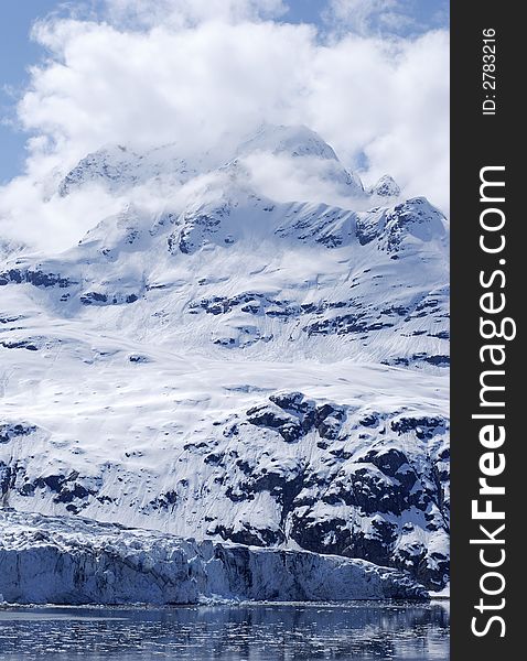 The view of glacier, mountain and clouds in Glacier Bay national park, Alaska.