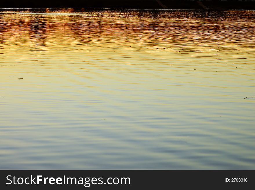 Summer sunset on a surface of a lake Jarun in Zagreb. Summer sunset on a surface of a lake Jarun in Zagreb