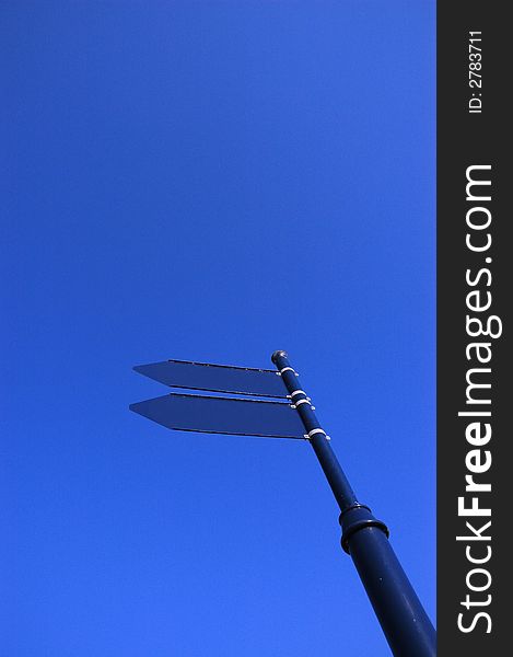 Photo empty sign on the blue sky. Photo empty sign on the blue sky