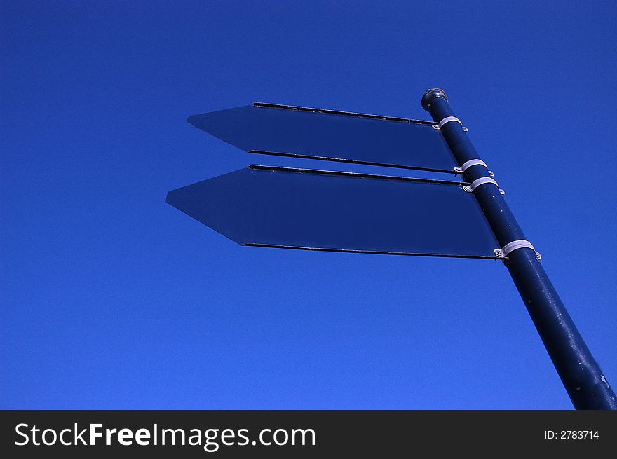 Photo empty sign on the blue sky. Photo empty sign on the blue sky