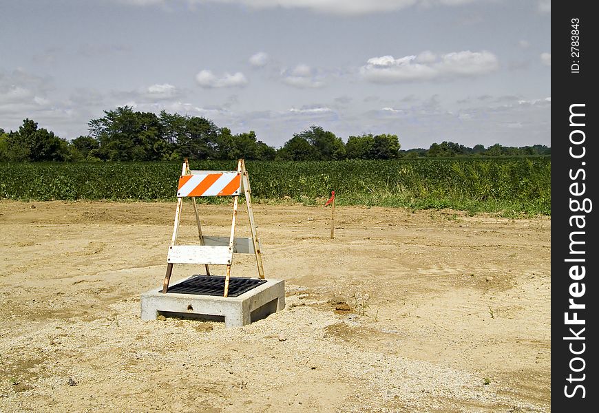 A construction sign, warning people to stay away. A construction sign, warning people to stay away.