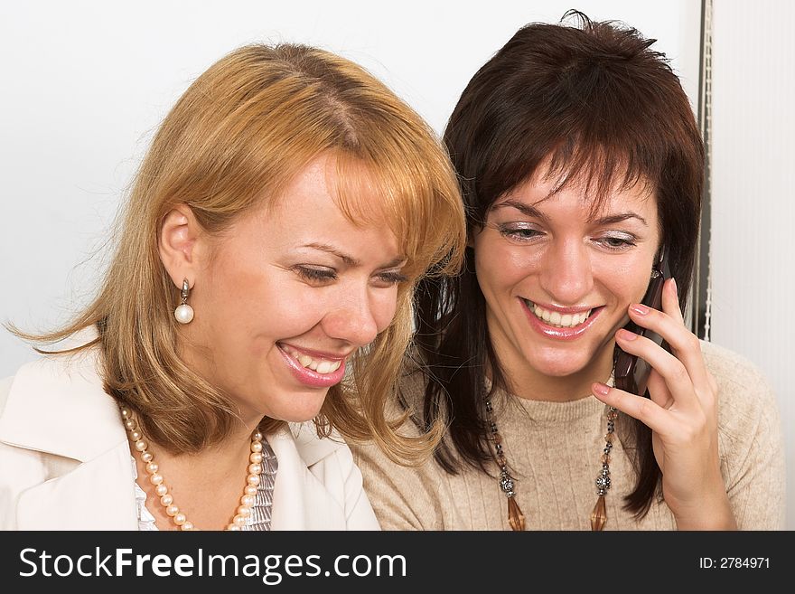 Two Young  woman with a mobile phone