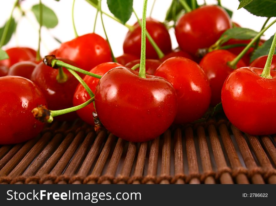 Red cherry  isolated on white -brown