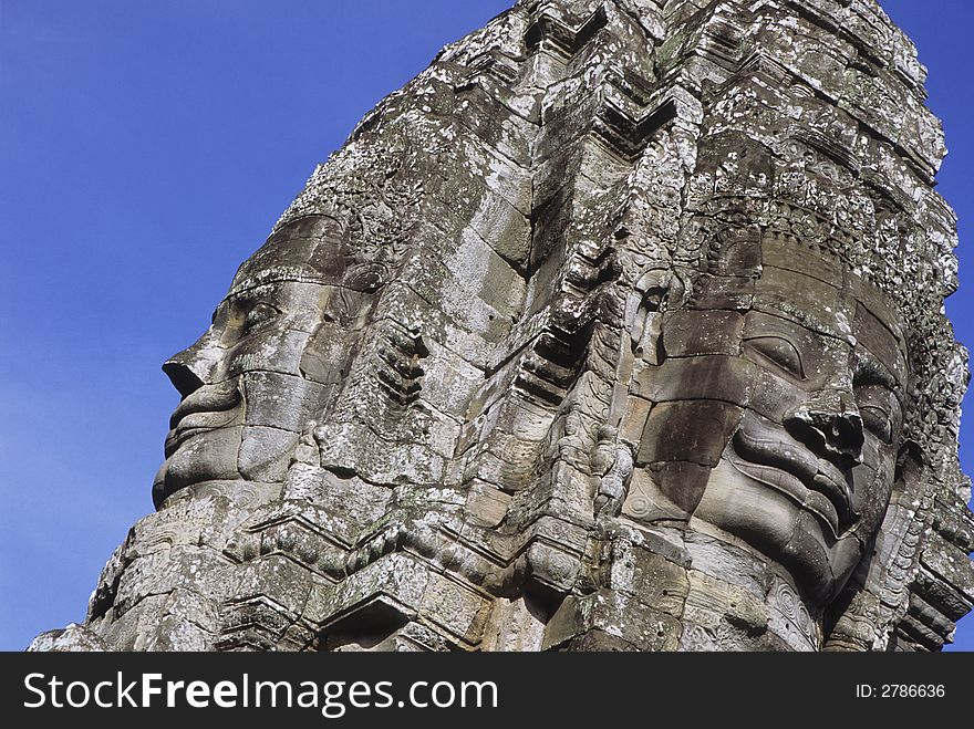 The faces of the Mahayana Buddhist King Jayavarman VII at Angkor Wat. The faces of the Mahayana Buddhist King Jayavarman VII at Angkor Wat