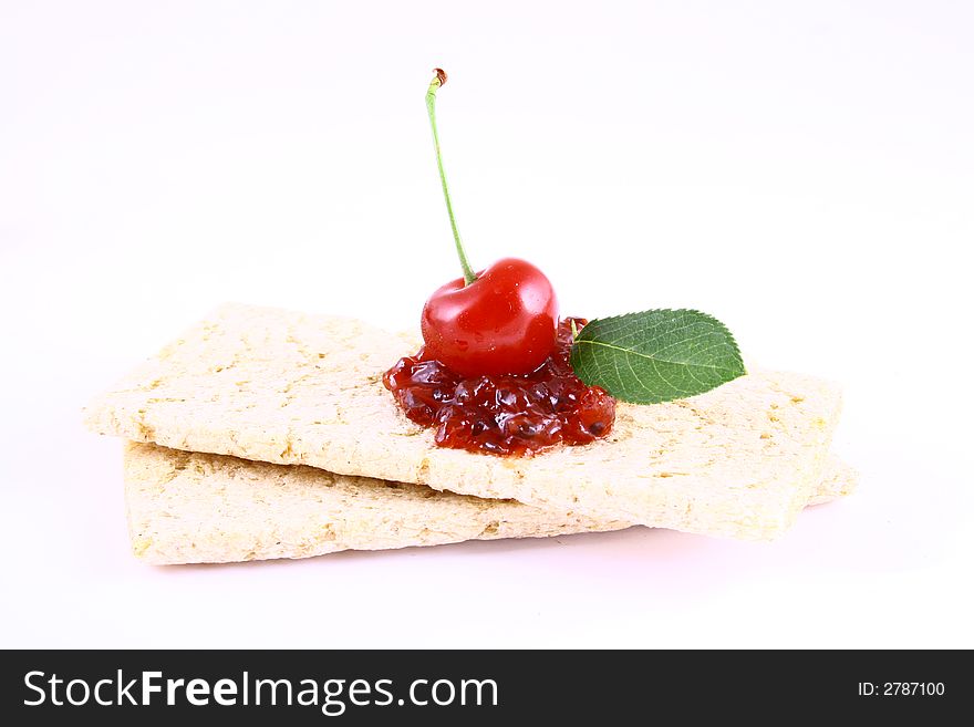 Red cherry jam isolated on white -brown. Red cherry jam isolated on white -brown