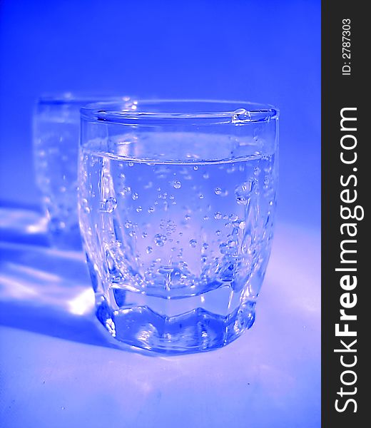 Glass With Water In Blue