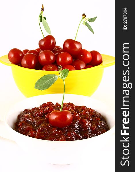 Red cherry jam isolated on white -brown. Red cherry jam isolated on white -brown