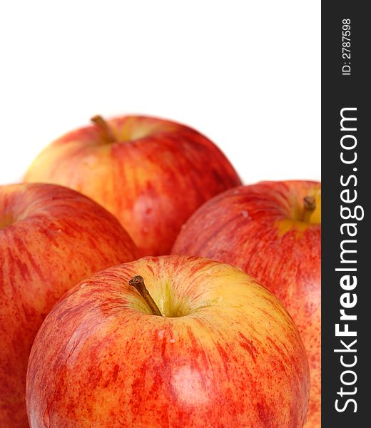 Four organic gala apples with a shallow depth of field isolated on white. Four organic gala apples with a shallow depth of field isolated on white
