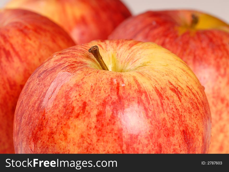 Four organic gala apples with a shallow depth of field. Four organic gala apples with a shallow depth of field