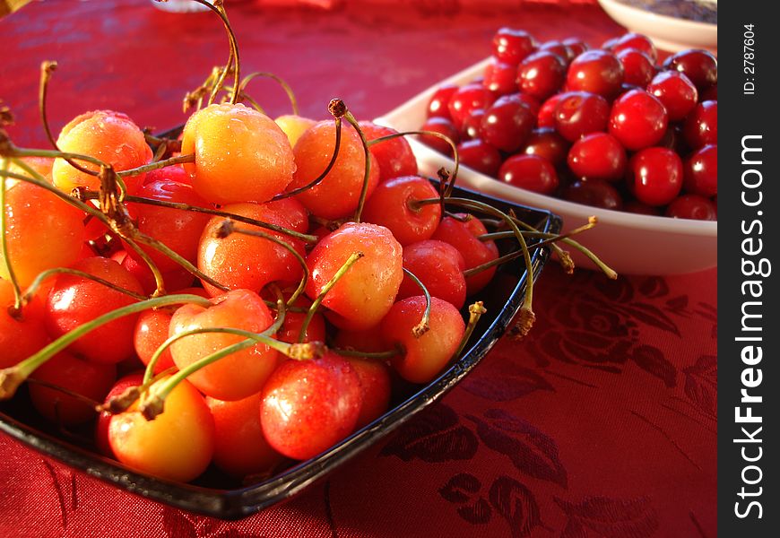 Fresh yellow and red cherry in bowl