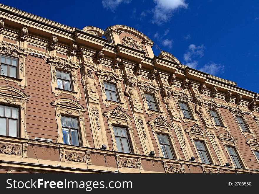 Brown historic building in Saint-Petersburg in summer, Russia
