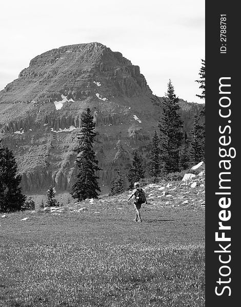 A man hiking and admires the view B+W. A man hiking and admires the view B+W