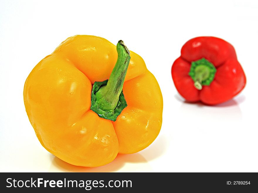 Multicolored Isolated bell peppers closeup. Multicolored Isolated bell peppers closeup