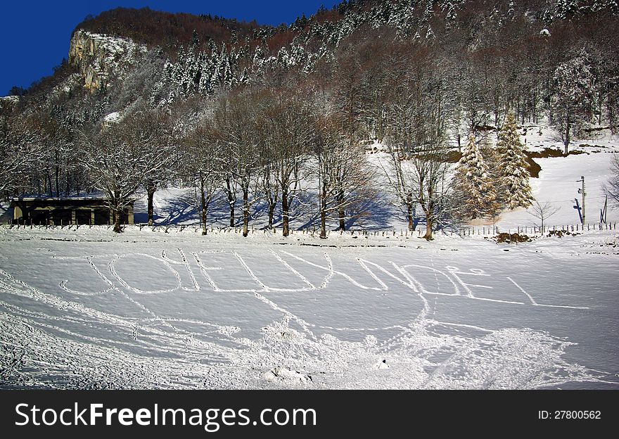 Merry christmas written in franch the snow. Merry christmas written in franch the snow.