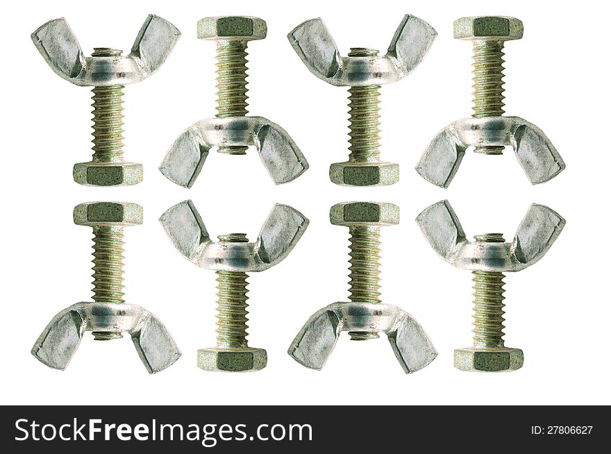 Bolts and wing nuts are arranged in two rows on a white sheet. Bolts and wing nuts are arranged in two rows on a white sheet