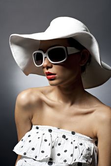 Young Beautiful Sexy Woman With Hat And Sunglasses Stock Images