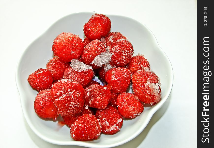 Frozen Strawberries On The Saucer