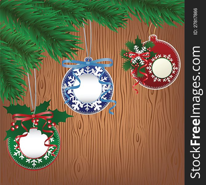 Christmas paper bauble on tree. Wood background. Christmas paper bauble on tree. Wood background
